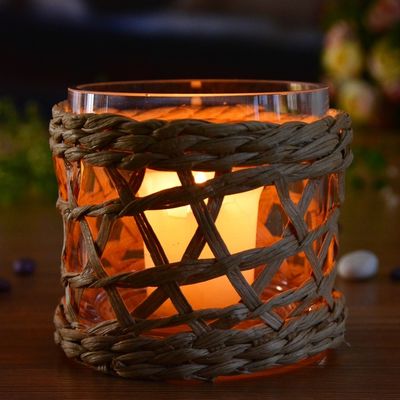 गुणवत्ता Round Creative Glass Candle Holders With Wicker Sleeve फैक्टरी