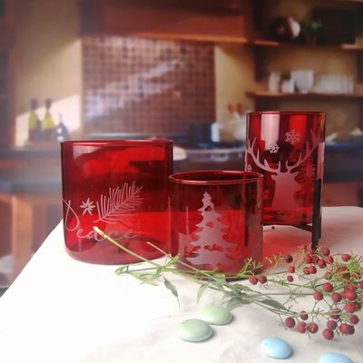 गुणवत्ता Brosilicate Glass Candle Holders With Etched Christmas Pattern फैक्टरी