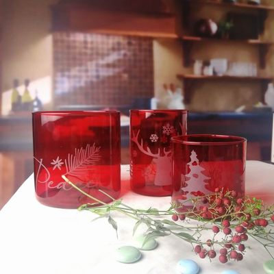 गुणवत्ता Brosilicate Glass Candle Holders With Etched Christmas Pattern फैक्टरी