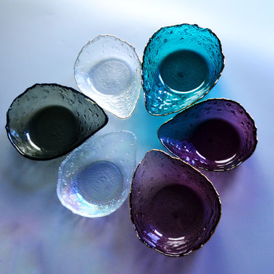 गुणवत्ता Exquisite Creative Water Drop Shape Glass Charger Plates फैक्टरी