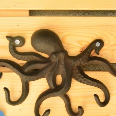 गुणवत्ता Wall Mounted Creative Octopus Cast Iron Hat Hooks फैक्टरी