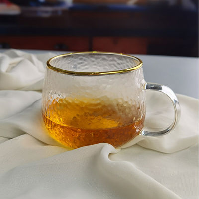 गुणवत्ता Borosilicate Hammered Texture Tumbler Drinking Glasses With Golden Rim फैक्टरी