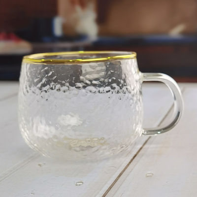 गुणवत्ता Borosilicate Hammered Texture Tumbler Drinking Glasses With Golden Rim फैक्टरी